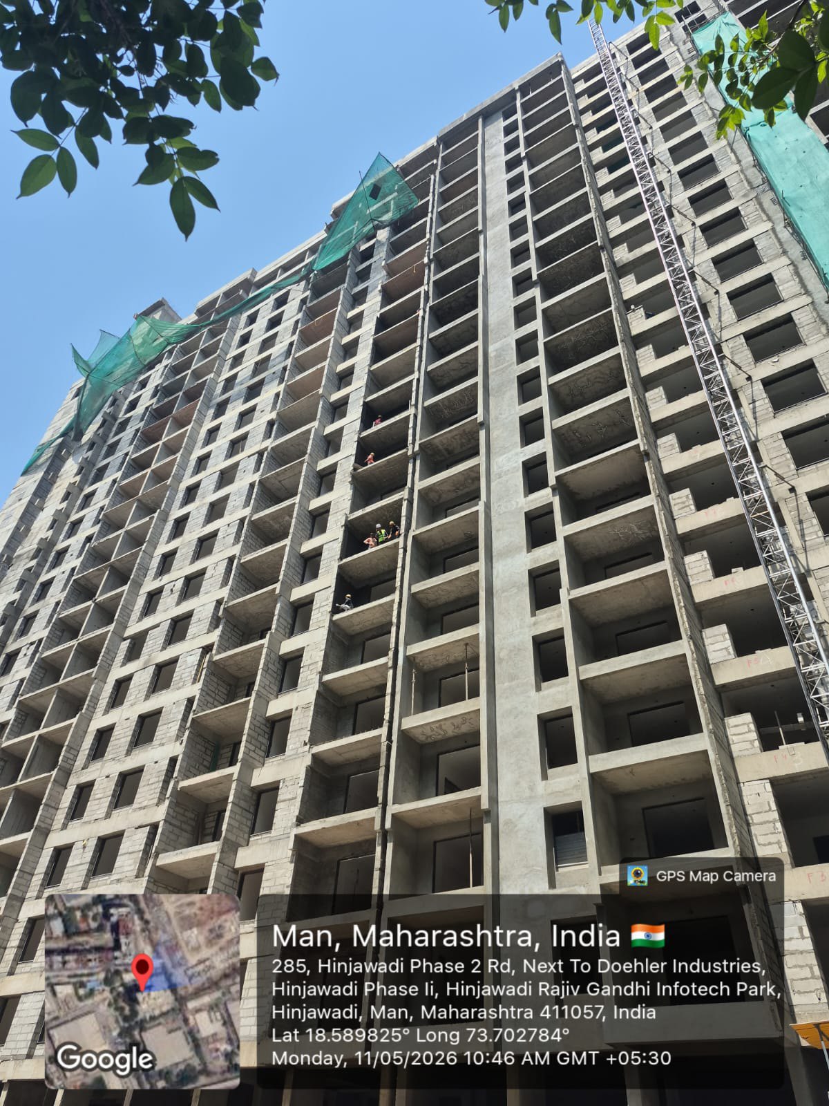 High-rise structural frame with safety netting
